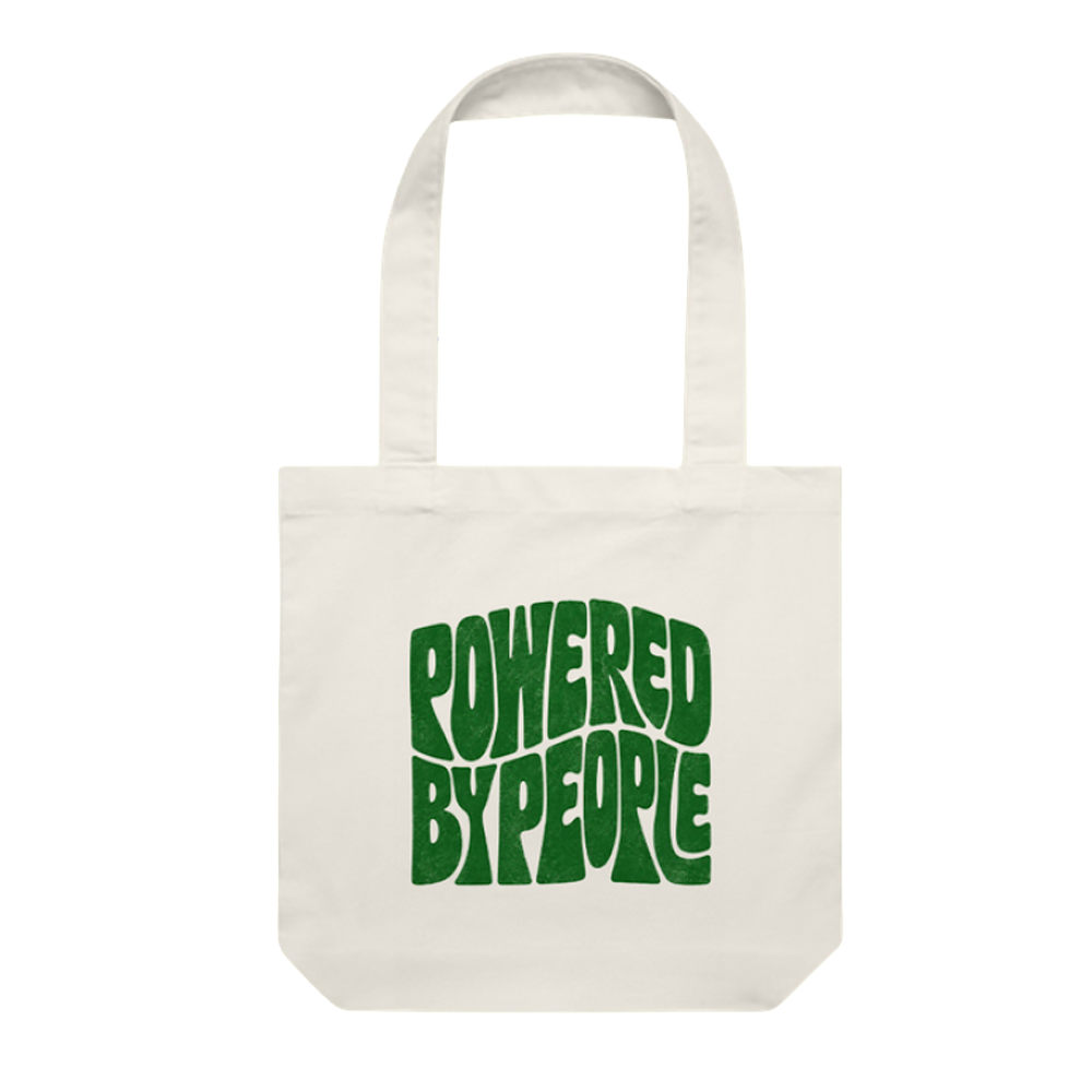 An off-white canvas tote bag with the phrase 'POWERED BY PEOPLE' printed in a bold, green, retro-style wavy font on the front, set against a plain white background.